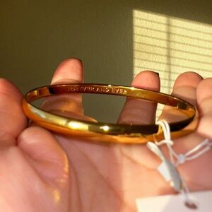 Kate Spade polished gold bangle bracelet engraved Forever and Ever